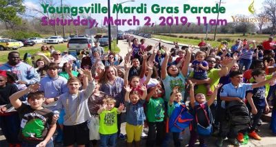 子供がたくさん写っているマルディグラの画像